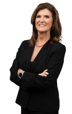 Kathy standing in law office